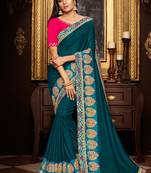 Dark teal embroidered silk saree with blouse