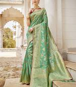 Sea green woven silk saree with blouse