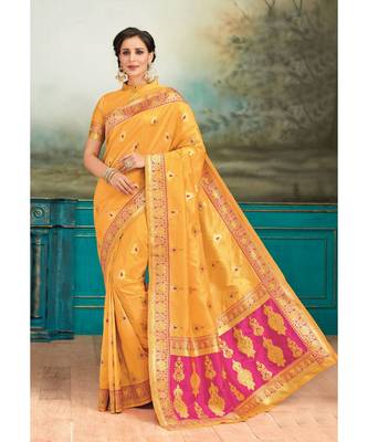 yellow woven silk blend saree with blouse 1