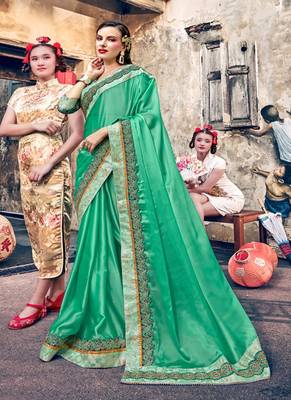   sea green embroidered georgette saree with blouse 1