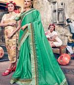   sea green embroidered georgette saree with blouse
