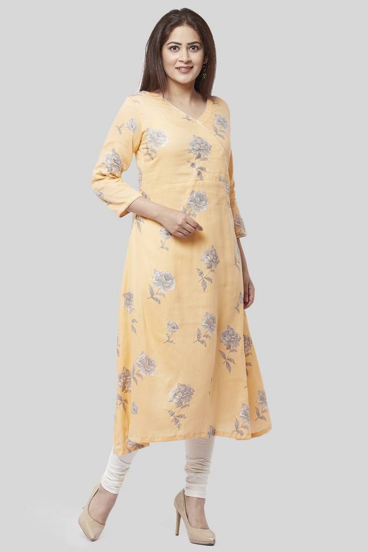 Melon Orange Angrakha Kurti with Off-White Churidaar