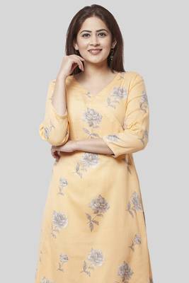 Melon Orange Angrakha Kurti with Off-White Churidaar 3