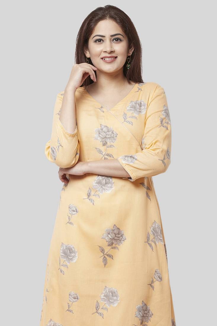 Melon Orange Angrakha Kurti with Off-White Churidaar