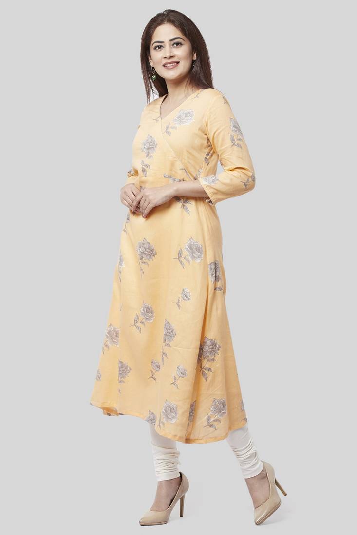 Melon Orange Angrakha Kurti with Off-White Churidaar