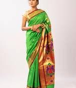Green hand woven silk blend saree with blouse