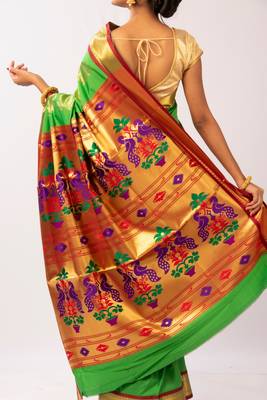 Green hand woven silk blend saree with blouse 4