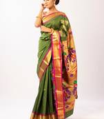 Green hand woven silk blend saree with blouse