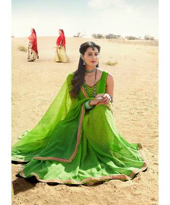 green printed chiffon saree with blouse 1