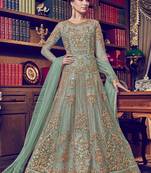 Turquoise embroidered net salwar