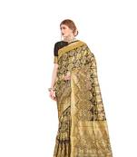Black woven faux banarasi silk saree with blouse