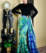 Sky Blue And Green Floral Printed Cotton Blended Linen With Royal Blue Zari Border