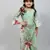 green top with attached net dupatta n floral green skirt