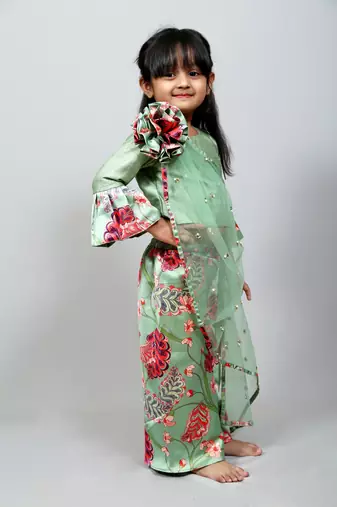 green top with attached net dupatta n floral green skirt