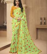 Green printed georgette saree with blouse