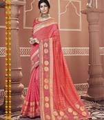 Pink embroidered georgette saree with blouse