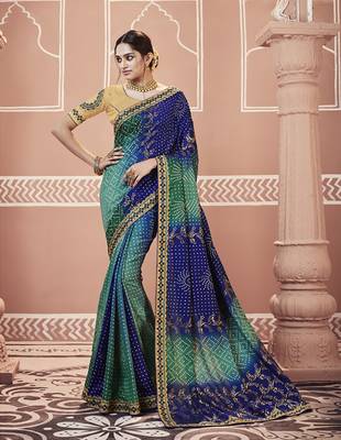 Blue embroidered georgette saree with blouse 1