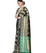 Black woven faux banarasi silk saree with blouse