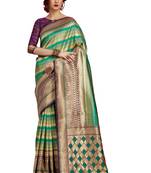 Green woven faux kanjivaram silk saree with blouse
