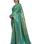 Teal woven faux kanjivaram silk saree with blouse