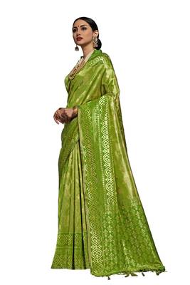 Green woven faux kanjivaram silk saree with blouse 1
