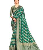 Green woven faux banarasi silk saree with blouse
