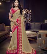 Beige embroidered silk saree with blouse