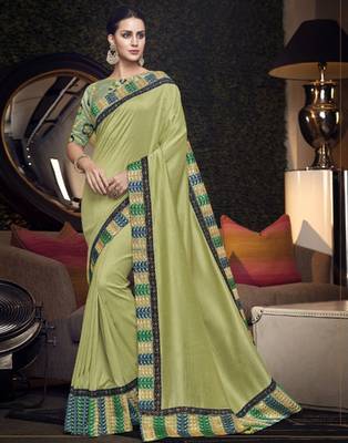 Green embroidered silk saree with blouse 1