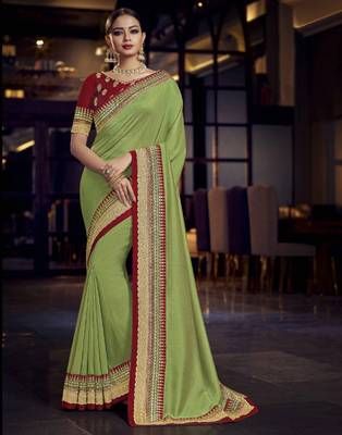 Green embroidered silk saree with blouse 1