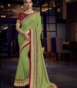 Green embroidered silk saree with blouse