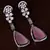 Black Gold Plated Baby Pink Stone and American Diamond Embellished Designer Danglers 216ED236