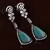 Black Gold Plated Sea Green Stone and American Diamond Embellished Designer Danglers 216ED237