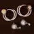 One Rhodium and One Gold Plated American Diamond Embellished Earrings 216ED244