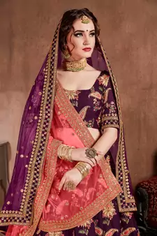 Attractive Purple Colored Fine Embroidered Designer Semi Stitched Lehenga Choli For Women