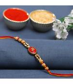Om Motif Red Base Sandalwood Rakhi
