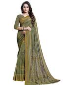 Green woven Silk blend saree with blouse