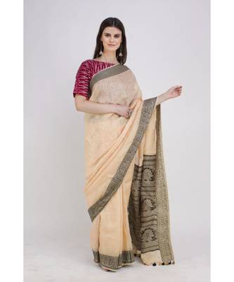peach Soft linen saree with tassel in the pallu and running blouse 1