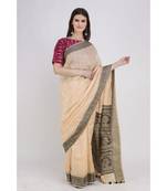 peach Soft linen saree with tassel in the pallu and running blouse