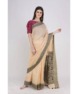 peach Soft linen saree with tassel in the pallu and running blouse 2