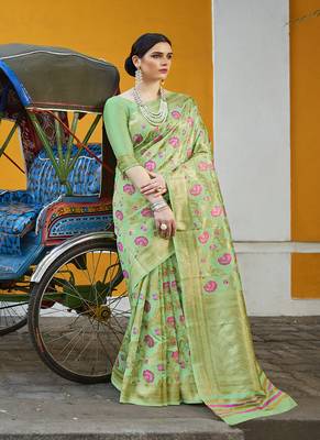   light green woven silk blend saree with blouse 1