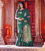   dark green woven silk blend saree with blouse