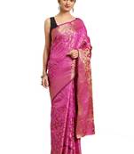Pink woven banarasi silk saree with blouse
