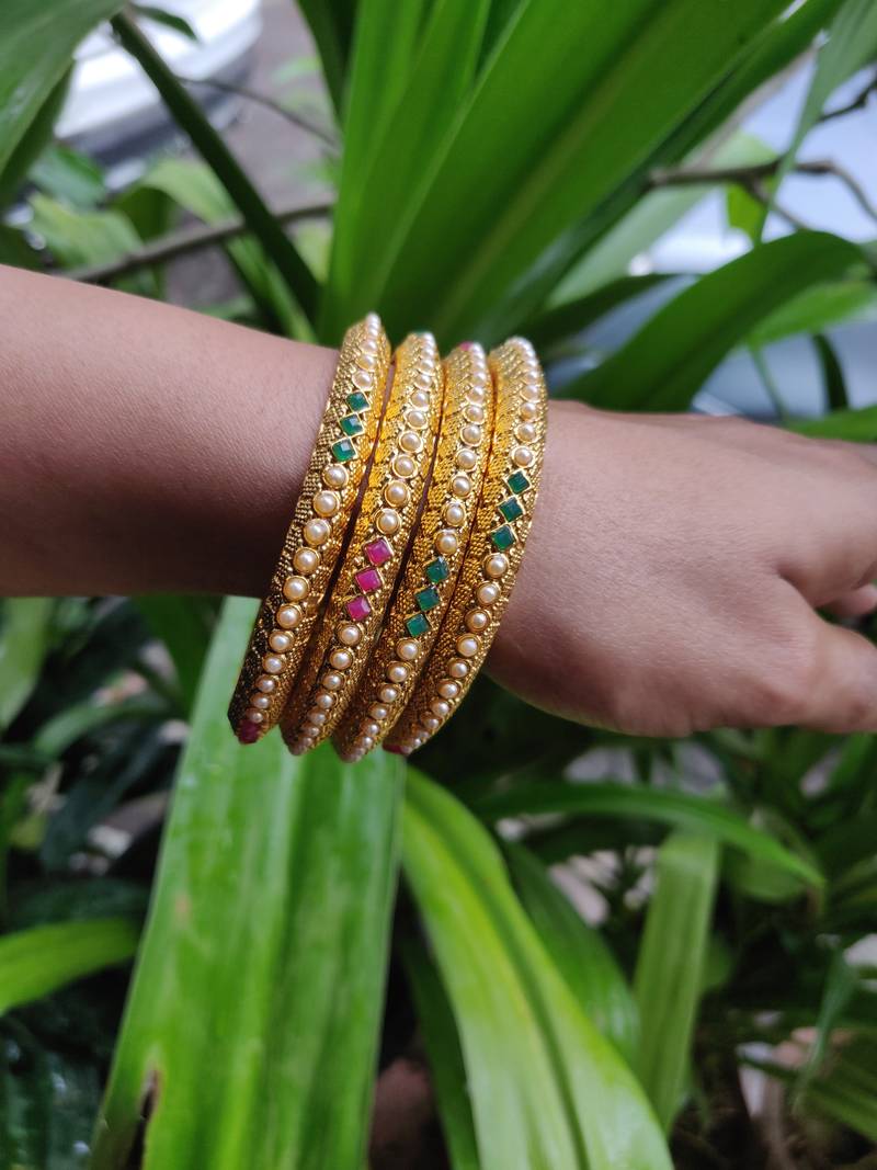 Gold Plated And Multicolour Beaded Bangles Set Of 4