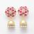Kanishka Golden-Pink Jhumki Earrings