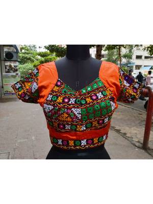 Orange Coloured Mashru Silk Embroidered With Real Mirror Worked Blouse With Pompom Dori At Back side 1