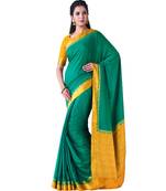 Green Woven Crepe Saree With Blouse