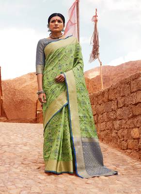 light green woven silk blend saree with blouse 1