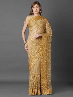 Beige embroidered net saree with blouse 1