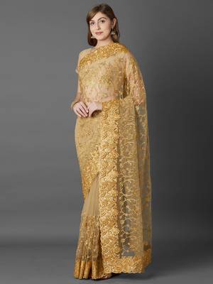 Beige embroidered net saree with blouse 3