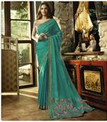 Turquoise embroidered georgette saree with blouse
